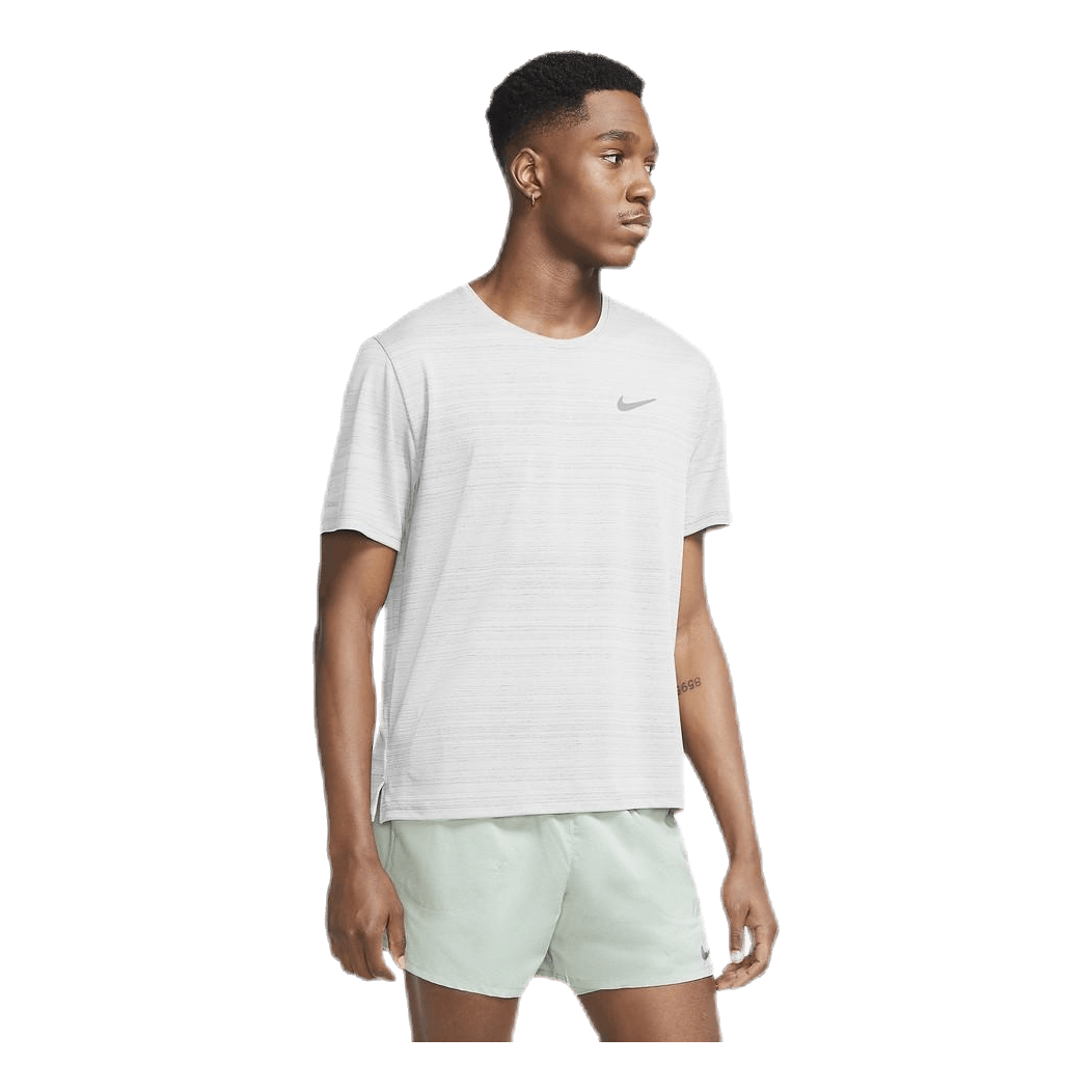 white and silver nike shirt