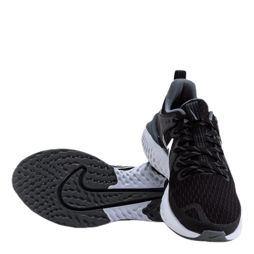 nike running legend react sneakers in black and white